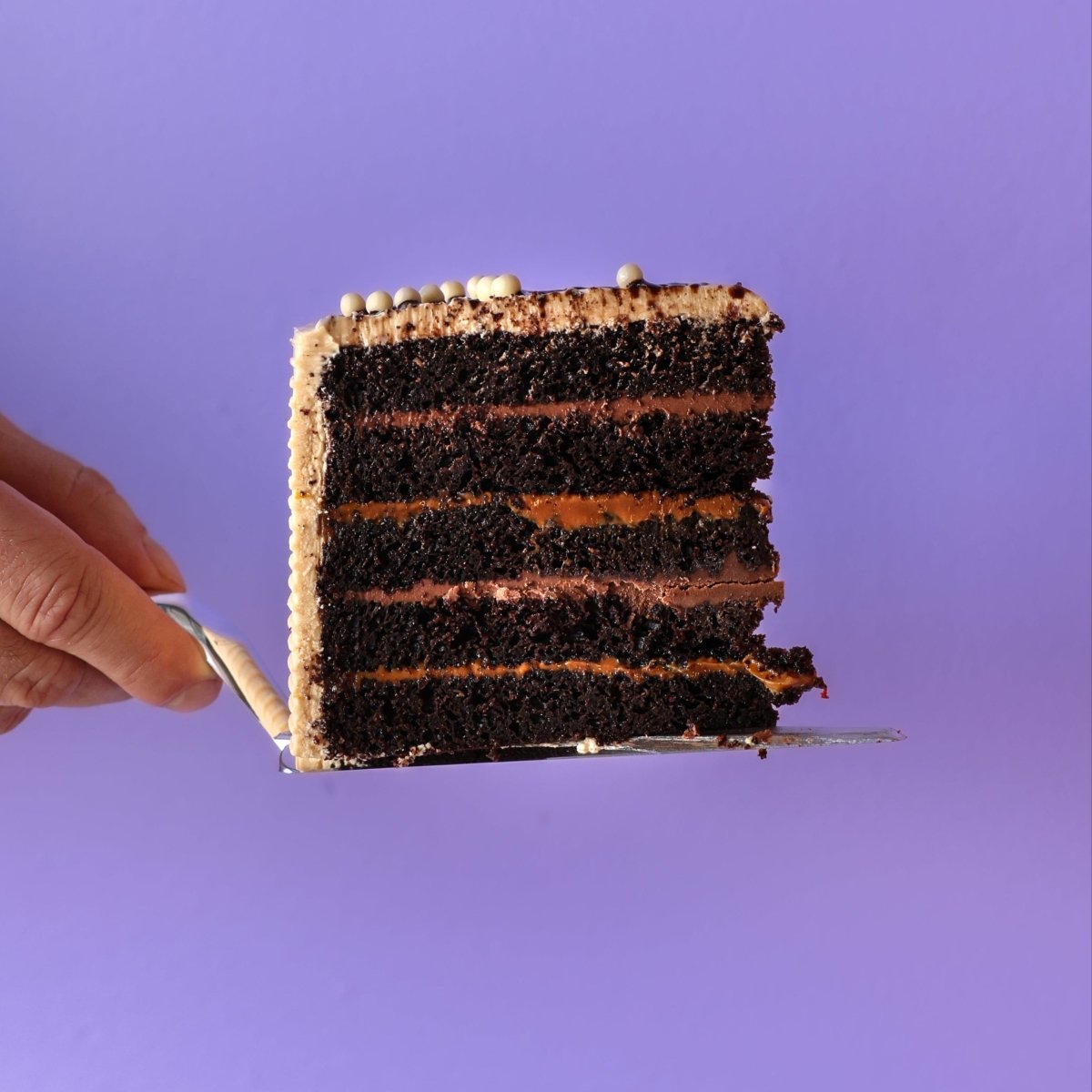 Chocolate Dulce de Leche Cake Slice - dbakers Miami